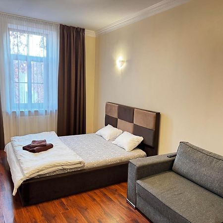 Aparthotel Riga Exterior foto A bedroom in a hotel