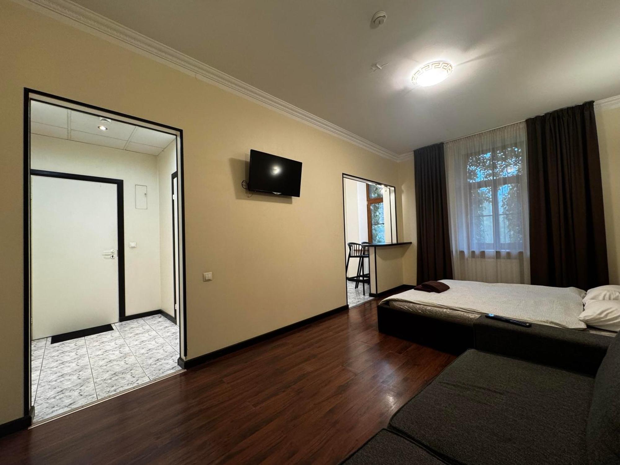 Aparthotel Riga Exterior foto A room at the hotel